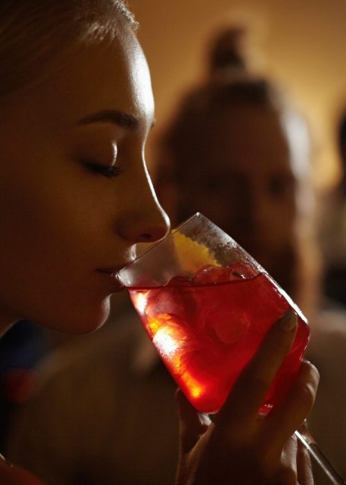 close-up-profile-of-glamorous-blonde-girl-enjoying-fresh-fruit-drink-sitting-at-bar-counter-next-to-p9dfwtkof6q8qwh9n9ko9xttz4hmt8xiecp03sxbh4